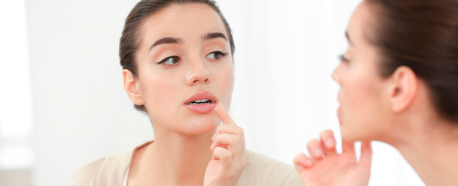 cual es la causa de las llagas en la boca